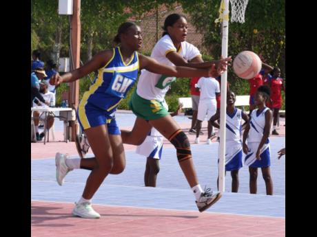 Gaynstead High’s Crystal Nicholson (left) and St Jago High’s Shania Robinson compete for the ball during their ISSA schoolgirls’ Urban netball match yesterday at the Leila Robinson court. Gaynstead won 42-26.