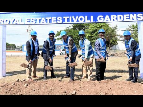 Prime Minister Andrew Holness (third left) last Friday broke ground for the $2.8-billion Royal Estates housing development project that will be constructed in Tivoli Gardens,  west Kingston. Also participating are (from left) Richard Mullings, director, M&M Jamaica; NHT Managing Director Martin Miller; Minister of Local Government and Community Development, and Member of Parliament for Kingston West, Desmond McKenzie; Chairman of the NHT Linval Freeman; and Mayor of Kingston Delroy Williams.