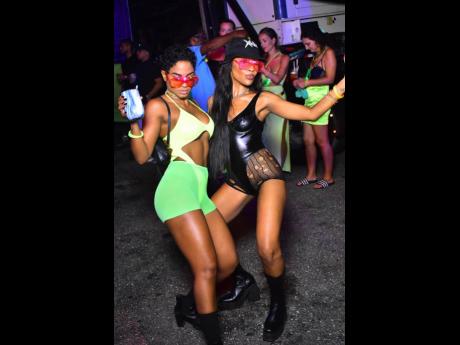 Two stunning women delighting in the music at Xodus Remedy.