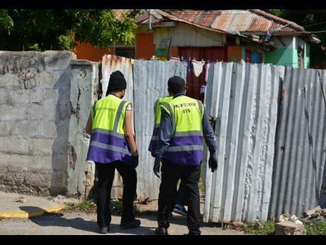 Independent Commission of Investigations personnel head to the scene where one man was killed in a reported confrontation with the security forces.