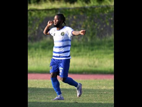 Vere’s Kemar Beckford celebrates after scoring against Lime Hall in their Jamaica Premier League encounter at Stadium East on Sunday.