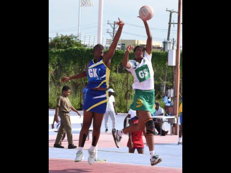 Gaynstead High’s Crystal Nicholson (left) and St Jago High’s Shania Robinson compete for the ball during their ISSA Urban schoolgirls netball match at the Leila Robinson Courts, recently. Gaynstead won 43-26.