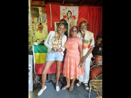 Keisha Schahaff (left) meets Earl ‘Chinna’ Smith, (right) reggae musician and original guitarist for Bob Marley. At centre is Flo Darby, chair of the Ardenne Alumni Foundation.