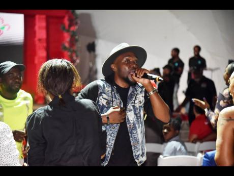 Kevin Downswell performs at last Thursday’s staging of Scotiabank’s ‘Christmas in the Park’, held at Emancipation Park, New Kingston.