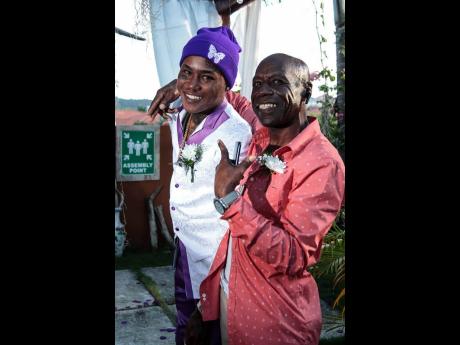 Dancehall artiste AceGawd (left) and his dad Clifford McLarty.