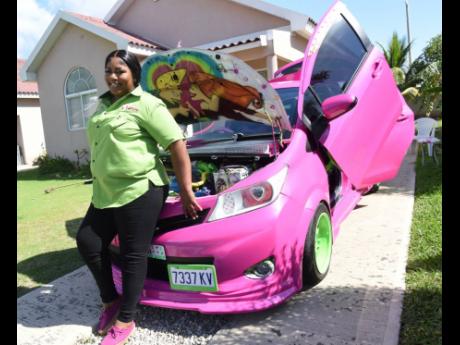 Credit: Ian Allen Sukeisha Daley and her ‘pimped out’ ride.