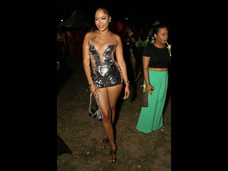 Oshin McDonald’s metallic bodycon fits like a glove.