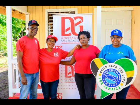 House recipient Audrey Ranger (second right) is flanked by representatives of the donors (from left), Dennis Beckford, D&G Foundation accountant; Totlyn Brown-Robb, D&G Foundation administrator; and  FFPJ Marketing and Development Manager, Marsha Burrell-Rose.