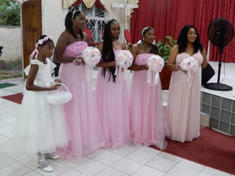 The bridesmaids and flower girl.