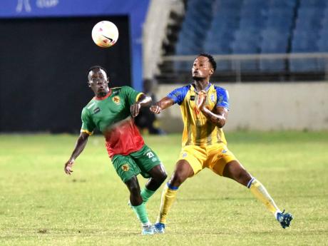 Andre Fagon (right) of Harbour View and Jardel Williams of Humble Lion battle for the ball during a Jamaica Premier League match at Sabina Park on November 13, 2023. The game ended in a 2-2 draw. 