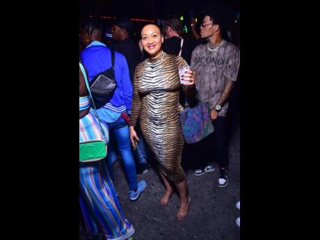 Julie, embodying the sweetness of her name, illuminates the launch of the CIGA-branded clothing line at Stone Love Headquarters, Burlington Avenue, St Andrew last week.