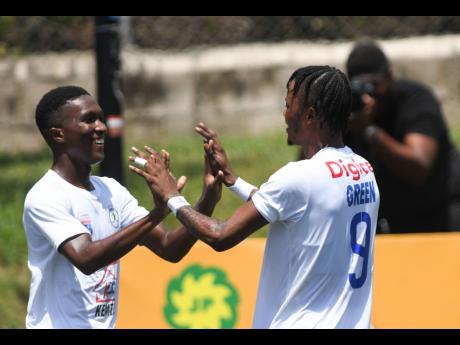 Mount Pleasant’s Devonte Campbell (left) and teammate Daniel Green. 