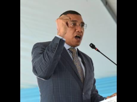 Prime Minister Andrew Holness speaks during the official launch of the Portmore Resilience Park on Wednesday.