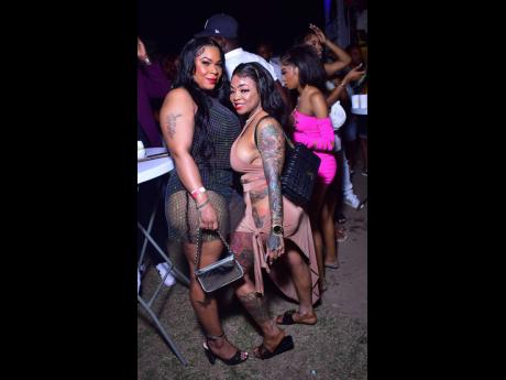 Gal pals Monique Malcolm and Kaliyah Lewis share lens space.