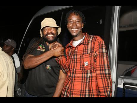 Tony Rebel (left) and Chi Ching Ching on night two of the 30th staging of Rebel Salute.