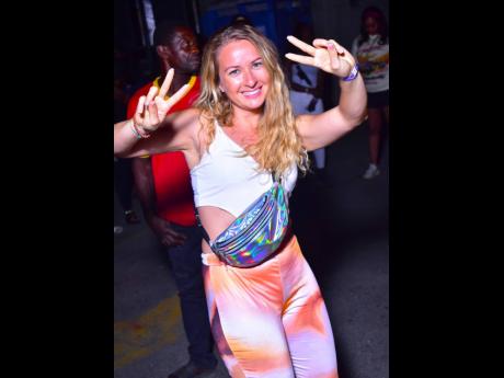 Credit: Anthony Minott This patron, from France, demonstrates her love of Jamaica’s rich entertainment culture.