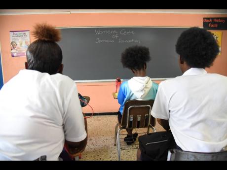 Teen mothers attend a class facilitated by the Women’s Centre of Jamaica Foundation. 