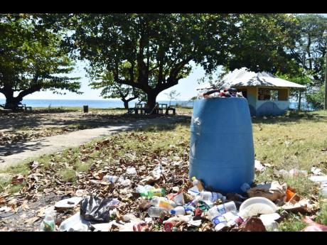 An overflowing garbage recepticle at Lyssons Beach in St Thomas 