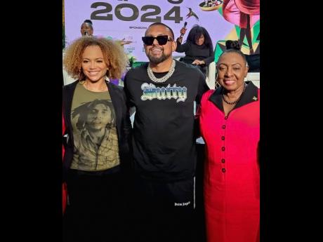 Minister of Culture, Gender, Entertainment and Sport,  Olivia Grange (right), poses with Grammy award-winning entertainer Sean Paul (centre), and American actress Sundra Oakley during the recent Jamaica Creative Career Expo, which was held at the Jamaica Conference Centre in downtown Kingston. 