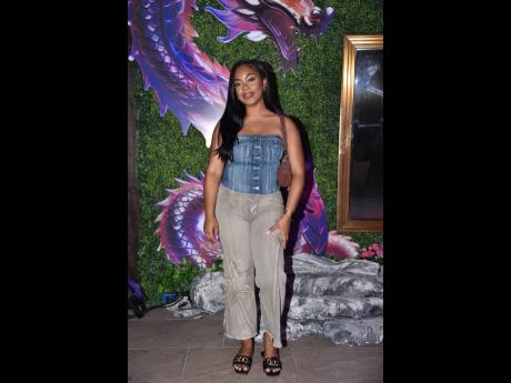 Brittny Simone poses for a picture in a denim-on-denim ensemble.