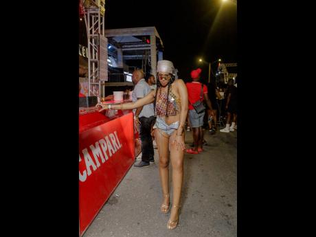 Credit: Contributed New York journalist Noel Walker experienced the unmistakable zest of Campari-infused festivities at Night Carnival.