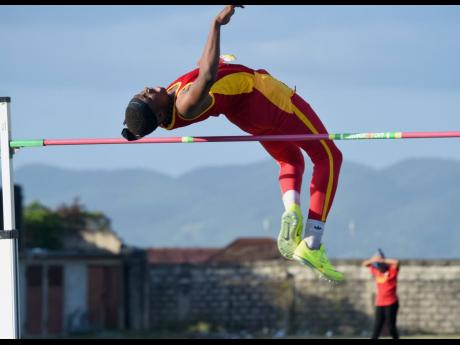 Carlyle Tingling goes over the bar while participating at the Grace/STETHS Invitational track and field meet in January at St Elizabeth Technical High School (STETHS). Tingling finished second in the event.