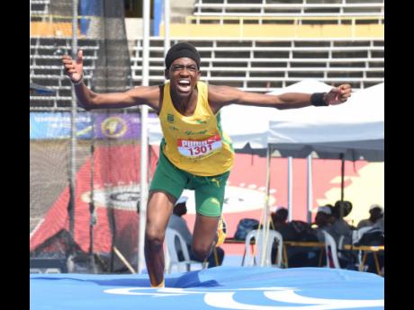 Credit: Ian Allen St Jago High’s Nikaro Johnson celebrates his victory in the Class Three boys’ high jump after clearing 1.87 metres at the ISSA/GraceKennedy Boys and Girls’ Athletics Championships at the National Stadium on Thursday.