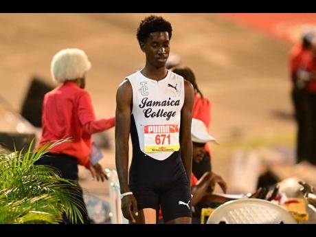 Jamaica College's Michael-Andre Edwards concentrates as he is about to jump in the Class Two boys' triple jump at the ISSA/GraceKennedy Boys and Girls' Athletics Championships at the National Stadium tonight. Edwards leapt 15.54 metres to break the 15.51 old mark.