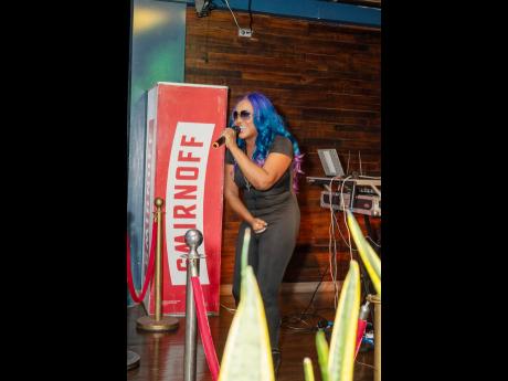 Photos by Sheldon Williams
Tanya Stephens in her element at the D5 Acoustic series show at R Hotel in New Kingston on Sunday.