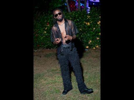 Dancehall artiste Kemar Highcon showing his support.Dancehall artiste Kemar Highcon showing his support.