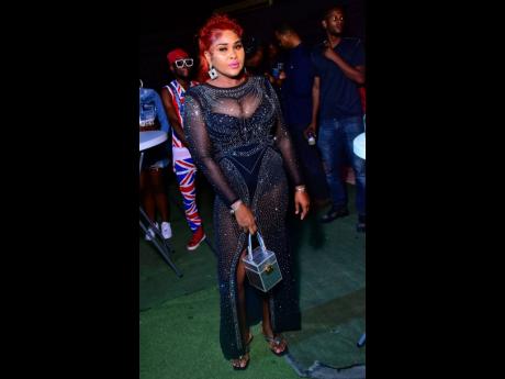 Credit: Anthony Minott Kimmie Wholesale is dressed to impress.