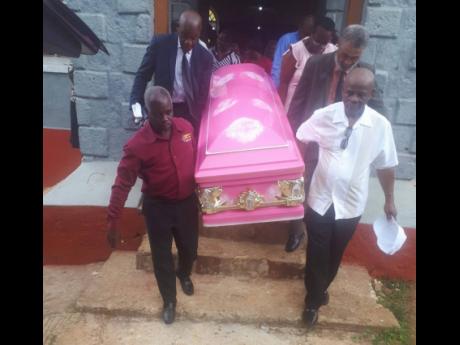 Pall-bearers removing the coffin of Evelyn Maud Johnson from the Waldensia Baptist Church in Sherwood Content.