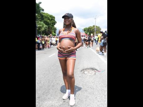 Though eight months pregnant, Tika Rutherford was out and about.