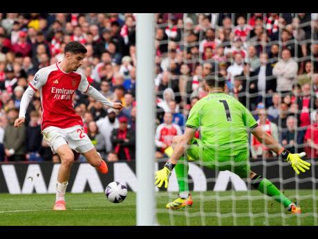 Arsenal’s Kai Havertz (left) misses an opportunity to score during their English Premier League football match against Aston Villa at the Emirates stadium in London yesterday. Arsenal won 2-0.
