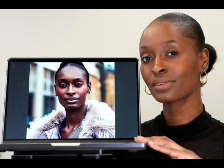 Fashion model Alexsandrah poses with a computer showing an AI generated image of her. (AP Photo/Kirsty Wigglesworth)