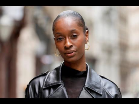 Fashion model Alexsandrah poses for a photograph, in London. The use of computer-generated supermodels has complicated implications for diversity. 
