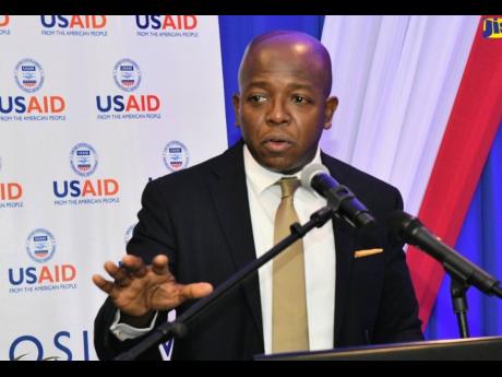 Labour and Social Security Minister Pearnel Charles Jr, addressing the recent United States Agency for International Development Positive Pathways Private Sector Forum.                                                                       