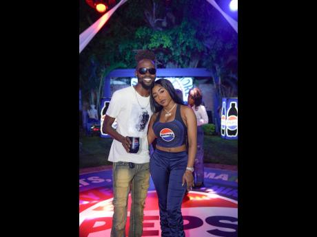 Pepsi-Cola brand ambassadors Romario ‘Laa Lee’ Ricketts and Stalk Ashley, the vibrant new face of Pepsi’s campaign, pause for a pic.