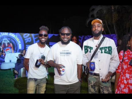 Popular dancehall artiste and face of the past Pepsi campaign, Romario ‘Laa Lee’ Ricketts (left), shares a moment with influencer Fat Skull (centre) and up-and-coming artiste Squiddytrap.