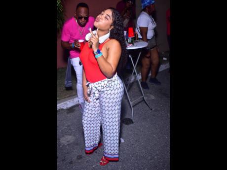 Georgia strikes her signature pose at 90s Pon Di Wharf, held recently at Newport Commercial Centre, Newport West, Kingston.
 
