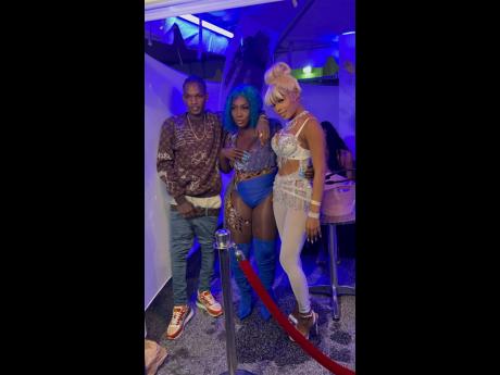 Jamaican dancehall acts (from left) Skeng, Spice, and Marcy Chin pause for pics.