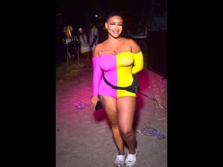 Trophy girl from Dream Dolls Bottle Service says hi to the STAR camera.