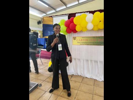 Walker Daughter addressing the students of Duhaney Park Primary School during Career Day.