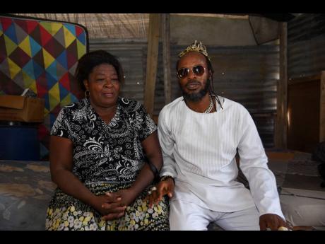 Credit: Antoine Lodge Photos LA Lewis chats with Shepherd.