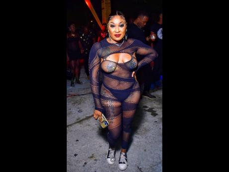 Tamara ‘Touch of Red’ from St Thomas turns heads at the party.