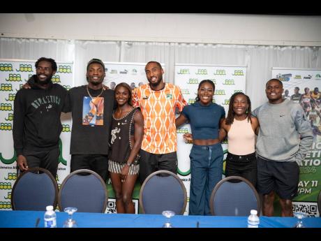 Some of the international athletes who will compete at the  Jamaica Athletics Invitational at the National Stadium pose during a press conference at The Jamaica Pegasus hotel on Thursday. From left: Kyron McMaster, Fred Kerley, Dina Asher-Smith, Matthew Hudson-Smith, Rushell Clayton, Marie Josée Ta Lou- Smith and and Christian Coleman.