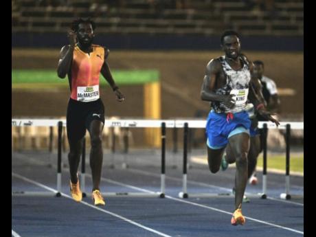 Credit: Ricardo Makyn Jamaica's Malik James-King (right), with a 48.39 seconds lifetime best, wins the men's 400 metres hurdles ahead of the British Virgin Island’s Kyron McMaster at the Jamaica Athletics Invitation at the National Stadium tonight.