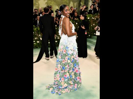 Actress and comedian Ayo Edebiri smiles for the cameras at the recent Met Gala in New York.