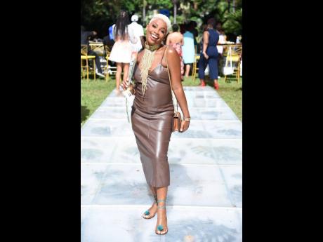 Shaphawa Hylton flashes a beautiful smile at the Minute Maid’s Mother’s Day Garden Brunch held on the weekend at Hope Gardens.