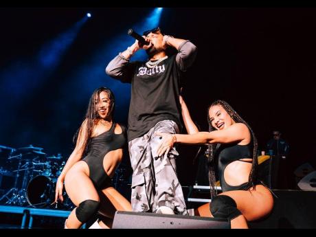 Grammy winner and dancehall stalwart Sean Paul coordinates with dancers during a live performance at his ‘Greatest’ tour in the US.